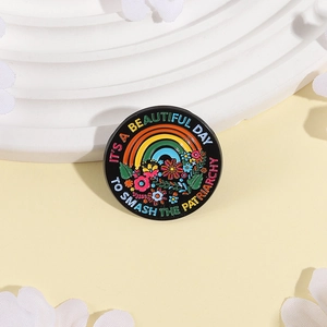 Enamel floral rainbow pin brooch with 'Beautiful Day to Smash the Patriarchy' text