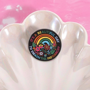 Rainbow flower enamel pin with It's a Beautiful Day to Smash the Patriarchy quote