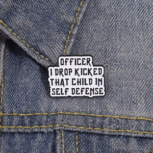 Creative coffee enamel pin badge on blue denim jacket with black lettering and punk style