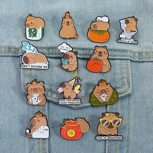 Cute Capybara enamel pins collection on denim jacket featuring funny cartoon poses
