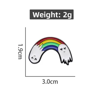 Détail du pin's arc-en-ciel avec fantômes indiquant le poids de 2g et la taille de 3cm