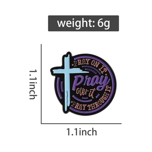 Detail of 1.1-inch religious enamel pin with Pray On It text weighing 6g