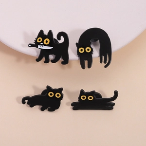 Set of 4 cute black cat enamel pins featuring unique feline poses and yellow eyes