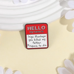 Enamel rectangle pin with 'Hello my name is' movie quote on a floral background