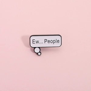 Creative enamel pin with Ew People text in white bubble design on pink background