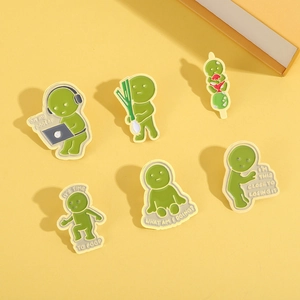 Set mit sechs lustigen grünen Emaille-Pins mit Humor-Text für die Rucksack-Dekoration