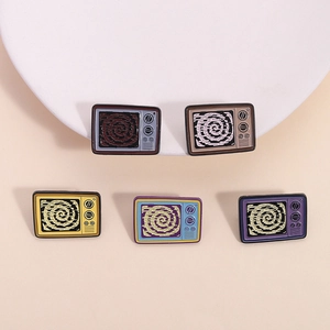 Retro TV enamel pin set with psychedelic spiral screen in five vibrant metallic colors