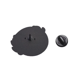 Macro detail of the matte black zinc alloy pin back and butterfly clasp on white background