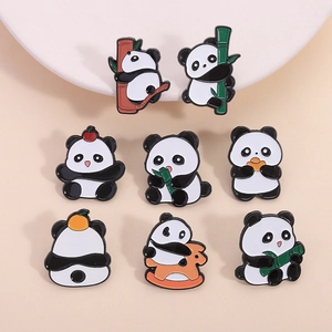 Set of 8 cute panda enamel pins in various poses with bamboo and fruit accents