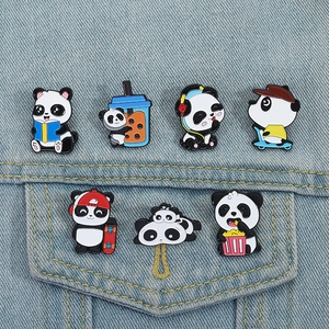 Set of 7 cartoon panda enamel pins featuring various cute poses on denim jacket