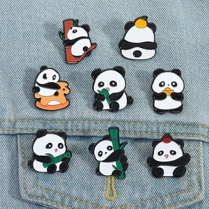 Detailed set of cute panda enamel pins on denim jacket showing various poses and bamboo