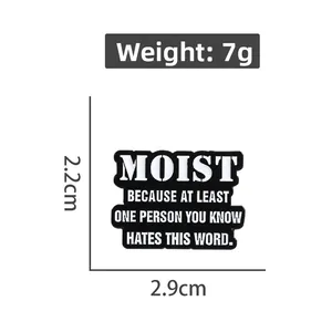 Detail view of rectangular enamel pin showing 2.2cm by 2.9cm dimensions and 7g weight
