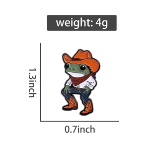 Détail du pin's grenouille cowboy avec poids de 4g et dimensions 1,3x0,7 pouces