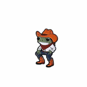 Cartoon frog cowboy enamel pin with dimensions 3.3cm by 1.9cm and 4g weight detail