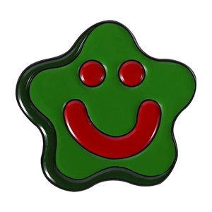 Funny green star shaped enamel pin badge with a bright red smiley face and metal edges