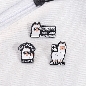 Detailed view of three llama enamel pins with funny quotes on white canvas background