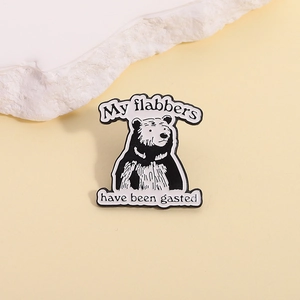 Pin's en émail ours drôle avec citation My flabbers have been gasted sur socle pierre