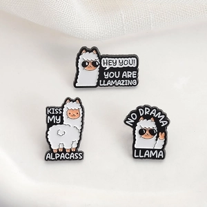Three cute alpaca enamel pins set with humorous text on a clean white textured background