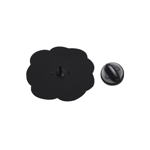 Detailed view of cloud-shaped alloy pin back with a black rubber clutch fastener