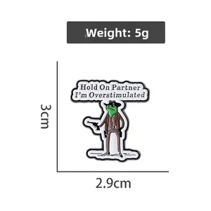 Detailed size chart showing 3cm x 2.9cm dimensions of cartoon frog cowboy enamel pin