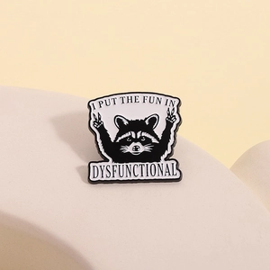 Cute raccoon enamel pin badge with I PUT THE FUN IN DYSFUNCTIONAL text slogan