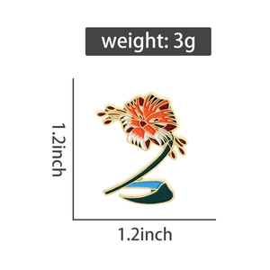 Detail of tiger lily enamel brooch with dimensions 1.2x1.2 inches and 3g weight
