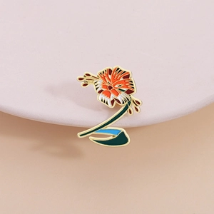 Artistic floral enamel pins with gold trim featuring colorful petals for backpack decor