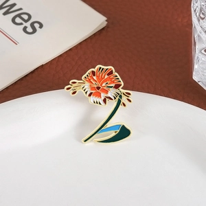 Creative tiger-face flower enamel brooch pin on a white plate with elegant props