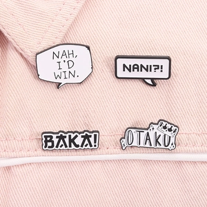 Macro shot of 4 enamel pins with anime catchphrases on a pink denim background