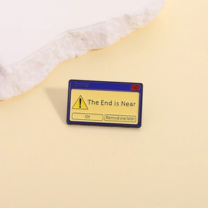 Macro detail of enamel pin featuring retro computer error popup and colorful graphics