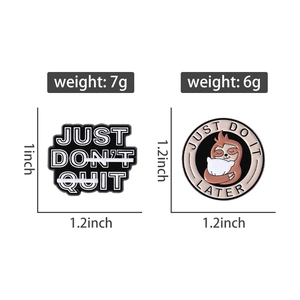 Detailed view of enamel sloth and motivational pins with precise size measurements