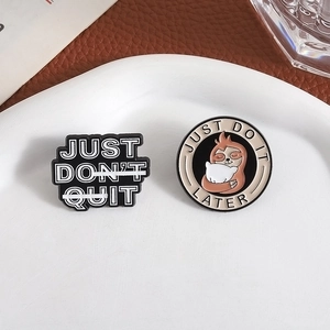 Cute sloth animal enamel pins with motivational quotes on a ceramic plate decor