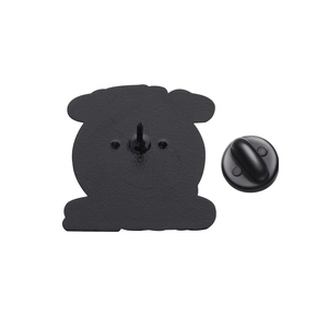 Detail view of the black enamel pin back with textured surface and rubber clutch fastener