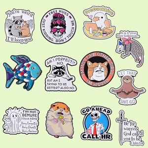 Collection of eleven cute cartoon animal enamel pins featuring funny humor quotes