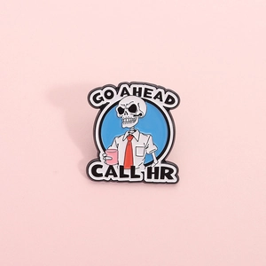 Skeleton enamel pin featuring Go Ahead Call HR text for workplace humor on lapel badge