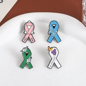 Lot de quatre broches en émail en forme de ruban pour la sensibilisation au SSPT