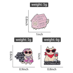 Detailed trio of enamel pins featuring cats with sunglasses and a pink cat house