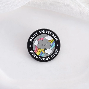 Round Daily Shitstorm Survivors Club enamel pin with cartoon rainbow and cloud design