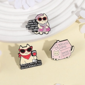Set of three cute cartoon cat enamel pins with sunglasses and a pink cat house