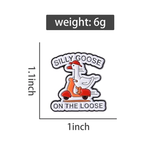 Detail view of cartoon goose enamel pin on scooter with size dimensions and weight