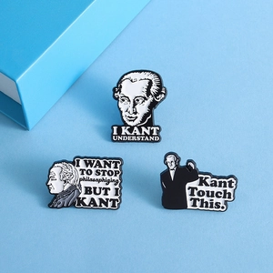Three-piece set of Immanuel Kant enamel pins with funny quotes on a light blue backdrop