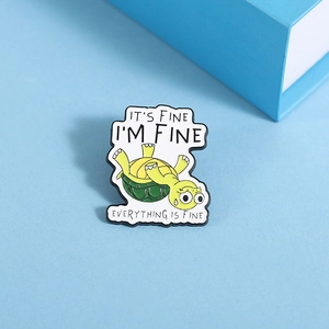 Funny turtle enamel pin with Everything is Fine quote on light blue background