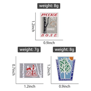 Detailed size chart of Russian enamel pins showing birch trees and traditional folk motifs