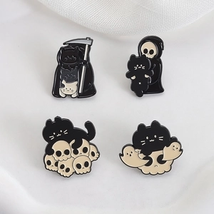 Set of four black grim reaper cat enamel pins with skull and ghost halloween motifs