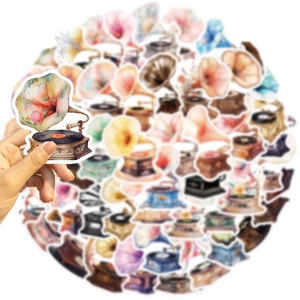 Macro shot of a floral gramophone sticker showing watercolor texture and die-cut edges