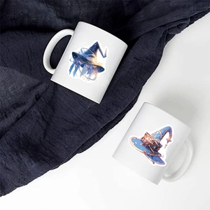 Detailed close-up of white ceramic mugs featuring anime-style magic hat illustrations