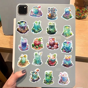 Close-up of 19 fantasy drink stickers showing miniature worlds on a tablet back