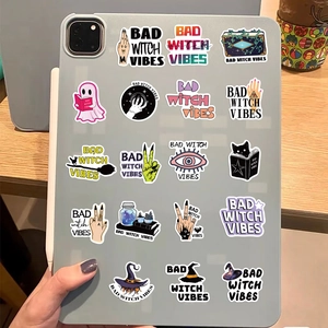 Waterproof Bad Witch Vibes stickers displayed on a tablet case with purple and pink theme