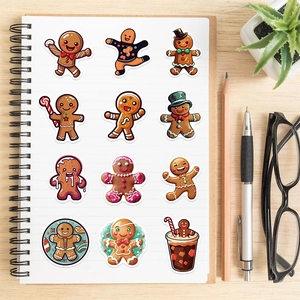 Detailed view of 12 waterproof cartoon gingerbread man stickers on a spiral notebook