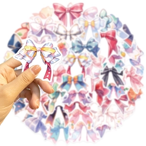 Pack of 50 cartoon bowknot stickers in pastel colors for laptops and DIY decoration